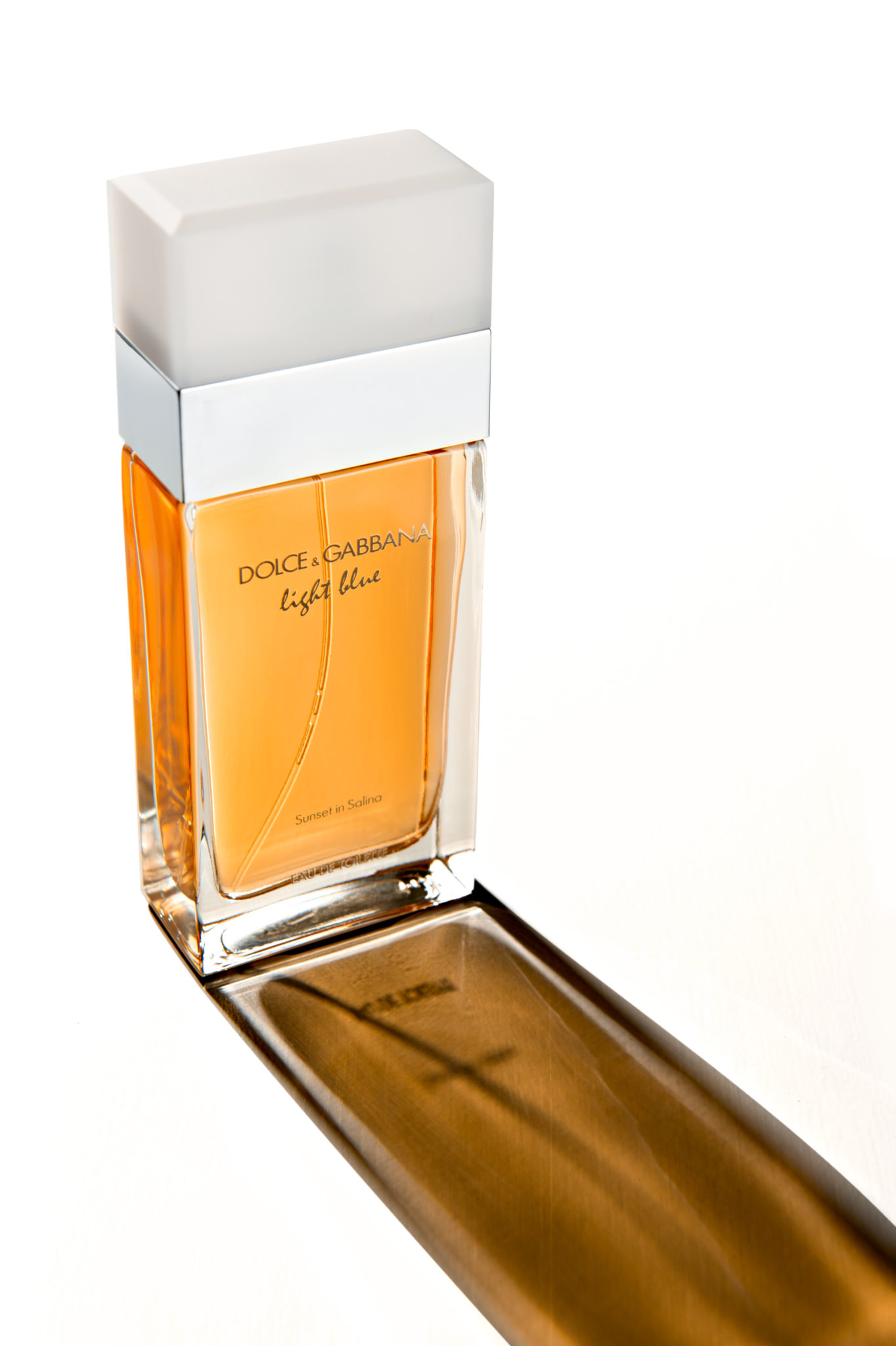 a Bottle of Dolce & Gabbana Light Blue Perfume shot in studio on a for a commercial