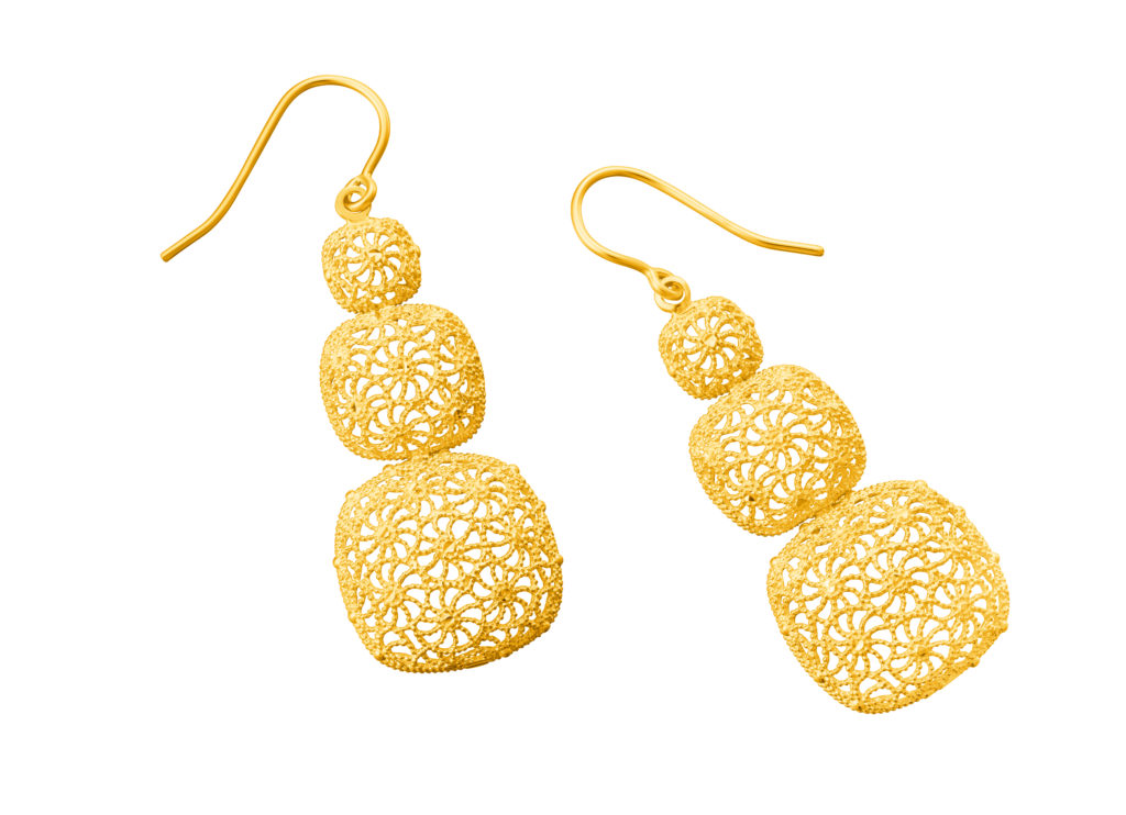 Big Golden Earrings Shot on a White Background